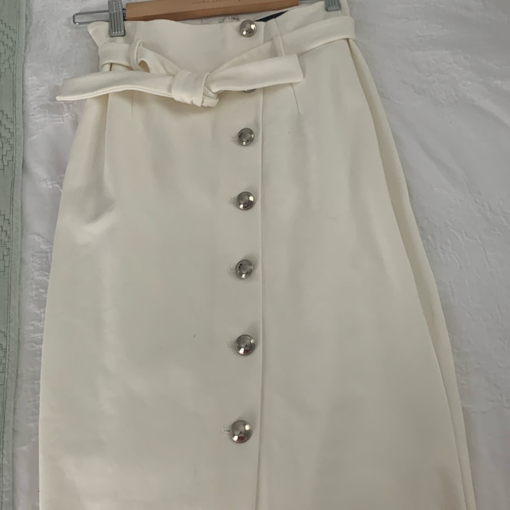 00 lined whbm ecru asymmetrical skirt. Ivory,